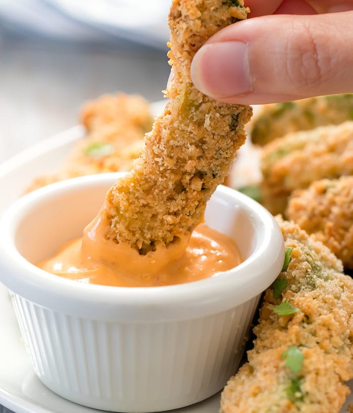 keto avocado fries dipped in sauce